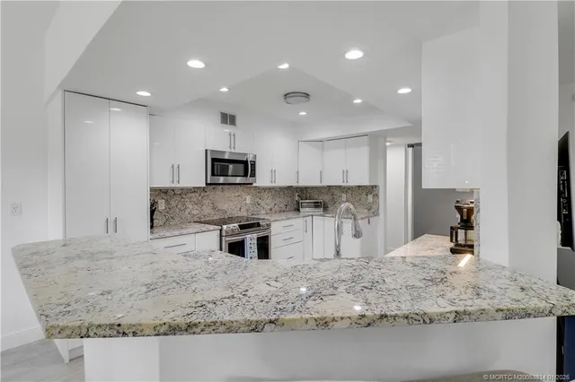 $675,000 | 303 Sea Oats Drive, Unit A, Juno Beach, FL 33408