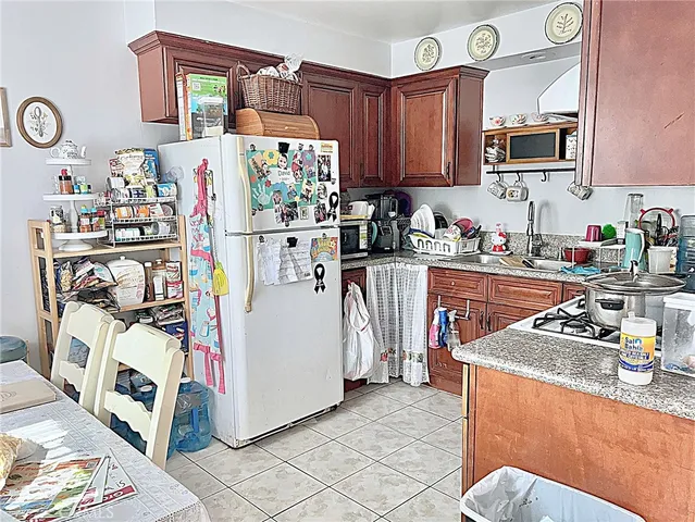 a view of bathroom with a sink mirror and toilet