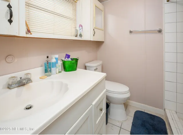 a bathroom with a sink and a toilet