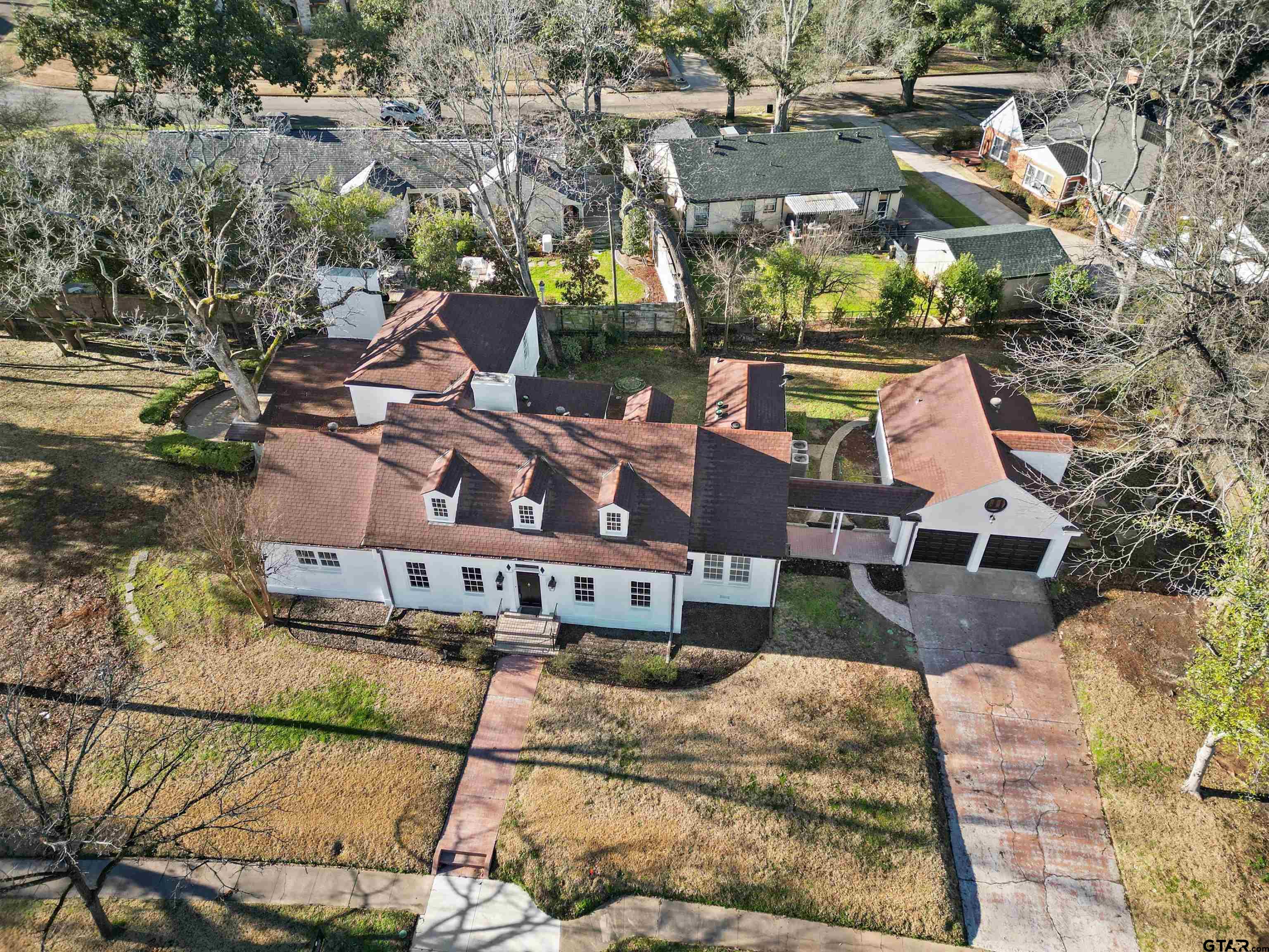 213 East 2nd Street Tyler, TX 75701 - Photo 3 of 48 an aerial view of a house with a yard