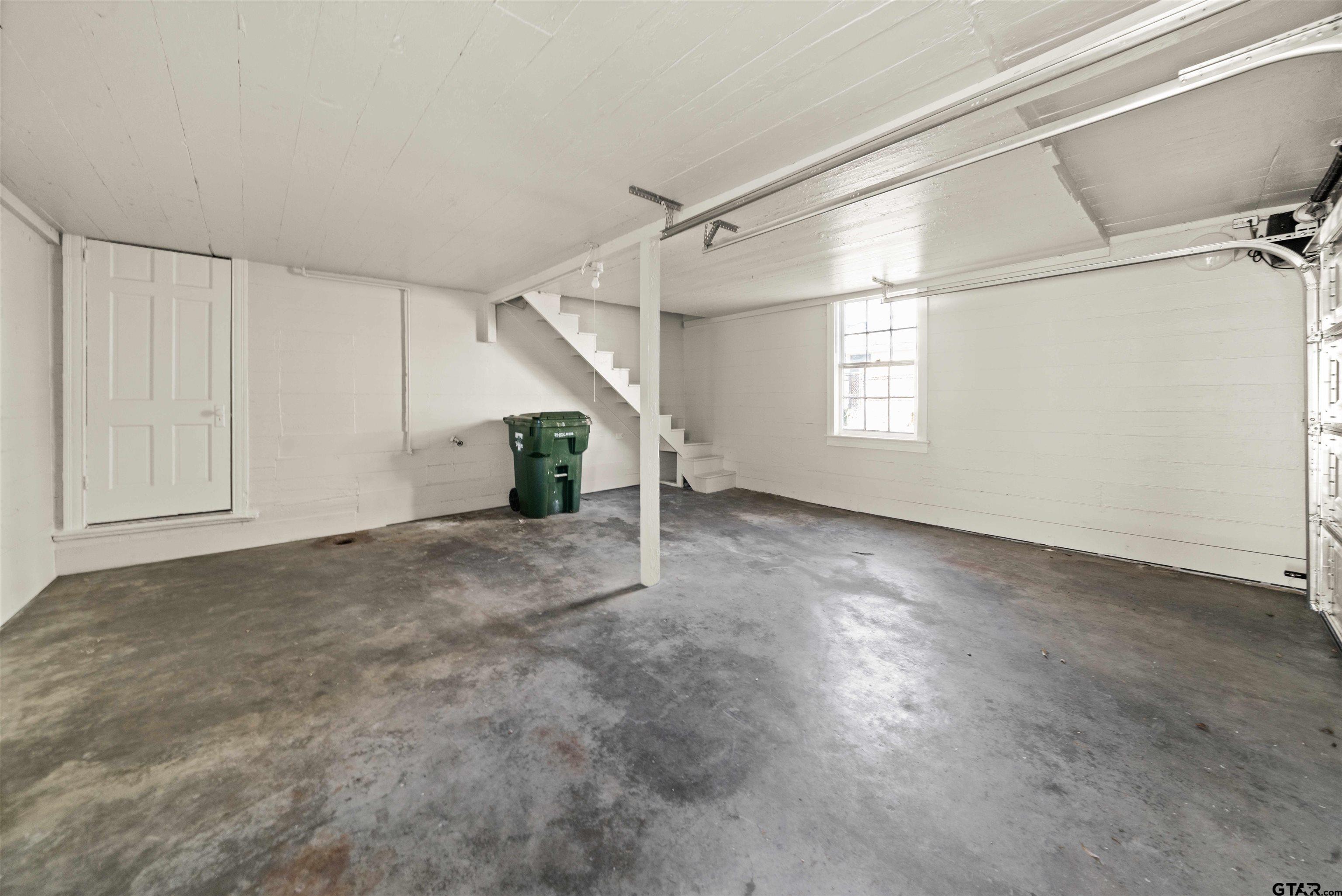 213 East 2nd Street Tyler, TX 75701 - Photo 39 of 48 an empty room with windows