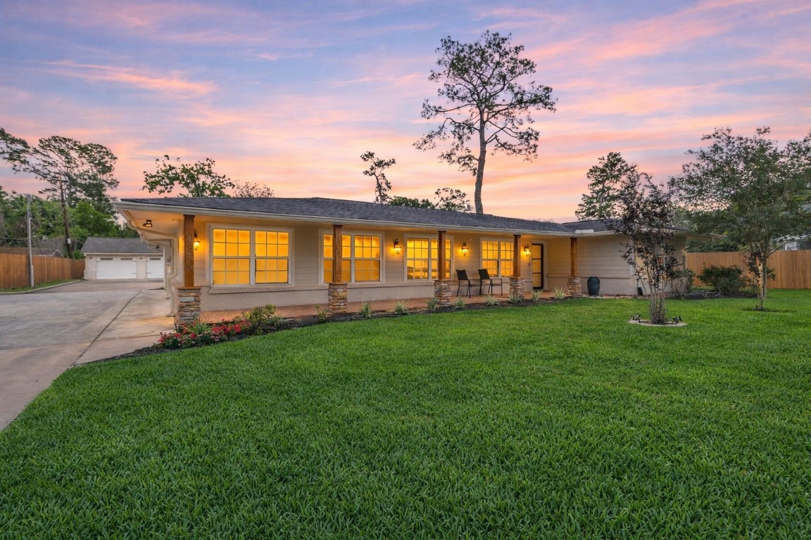 Walking up, your covered front porch starts to shine—perfect for morning coffee, evening chats, and slowing things down after a long day.