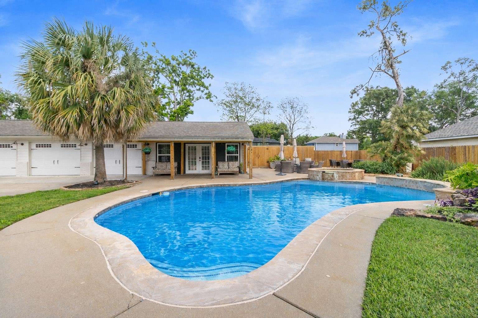 1914 Peppermill Road Houston, TX 77080 - Photo 13 of 43 From here, you really see it all—your pool, covered spaces, and multiple entertaining areas all coming together into one seamless backyard experience.
