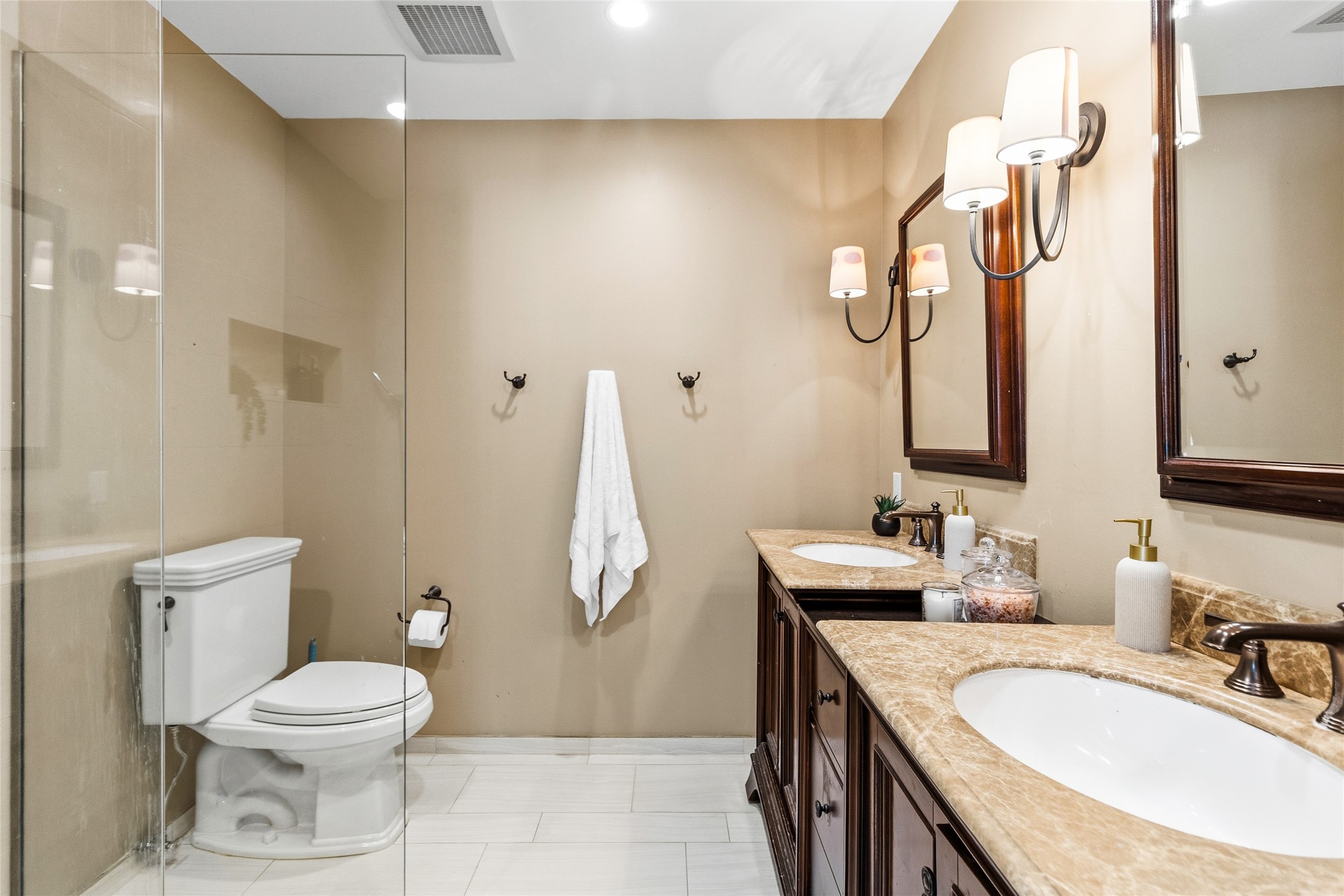 1914 Peppermill Road Houston, TX 77080 - Photo 24 of 43 Getting ready feels easier here with a spacious double vanity, giving you room to spread out while keeping everything organized and within reach.