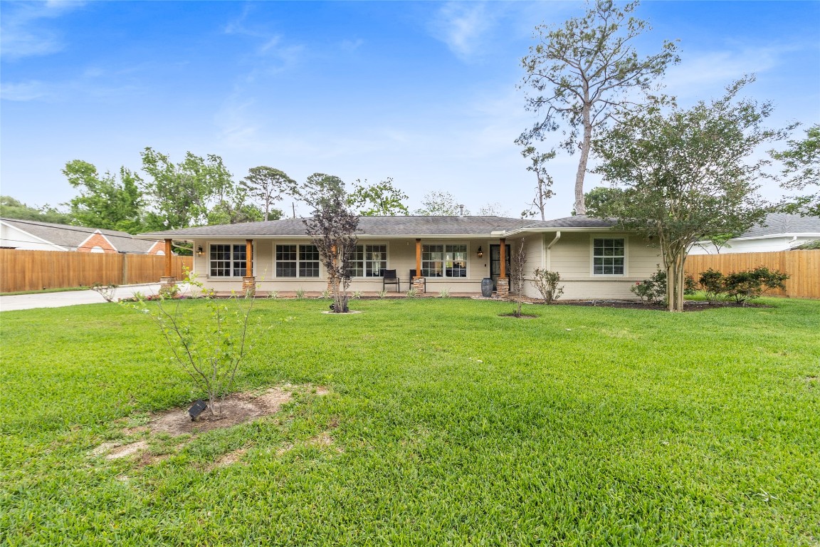 1914 Peppermill Road Houston, TX 77080 - Photo 26 of 43 From here, you really feel the space—your front yard stretches out, giving you that rare sense of openness and privacy before you even step inside.