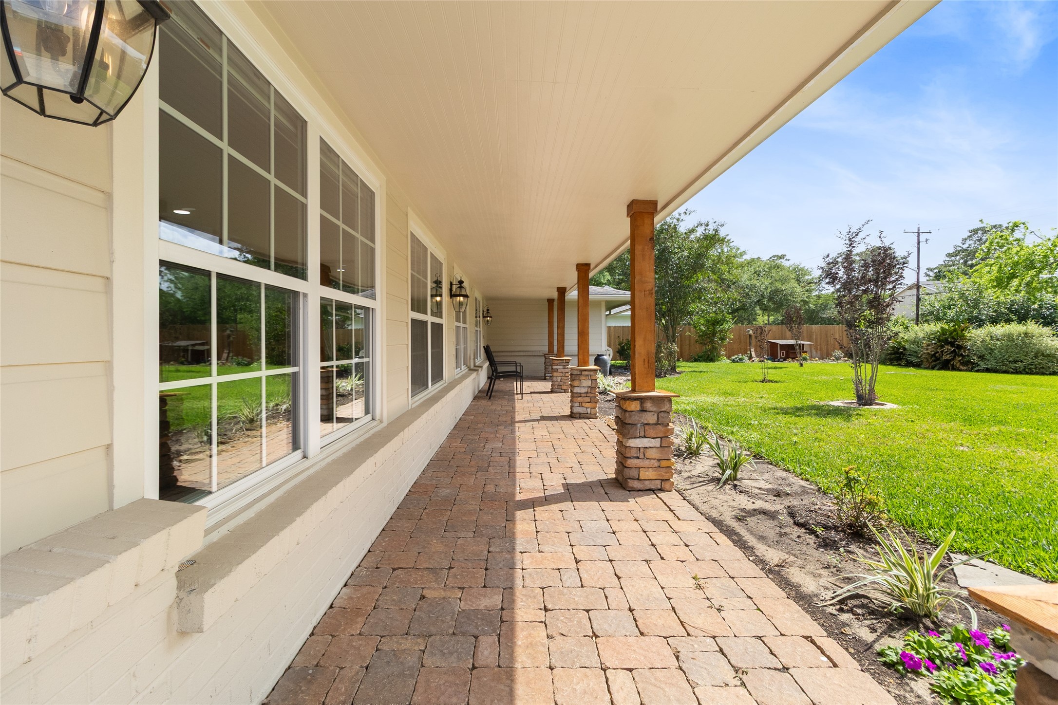 1914 Peppermill Road Houston, TX 77080 - Photo 27 of 43 Running along the back, your covered patio gives you a shaded extension of your living space—perfect for stepping out and staying a while.