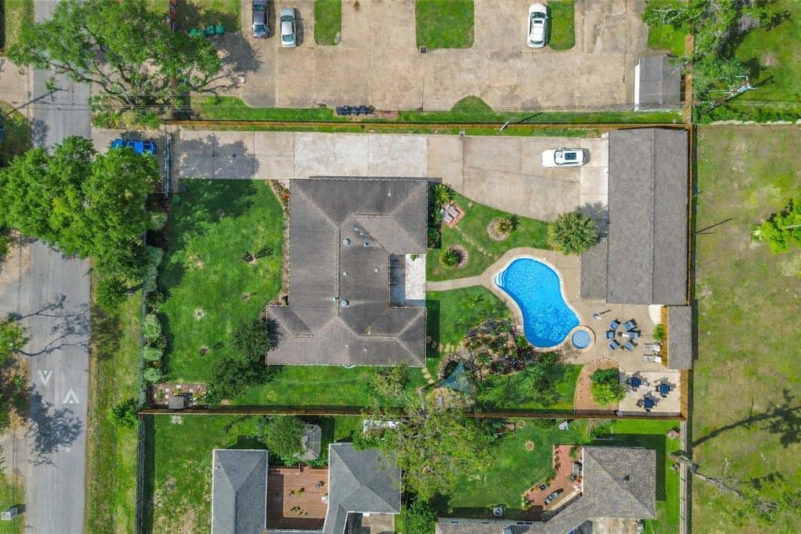 1914 Peppermill Road Houston, TX 77080 - Photo 3 of 43 From above, you really see it—your home sitting on an expansive lot with a backyard that feels like your own private retreat.