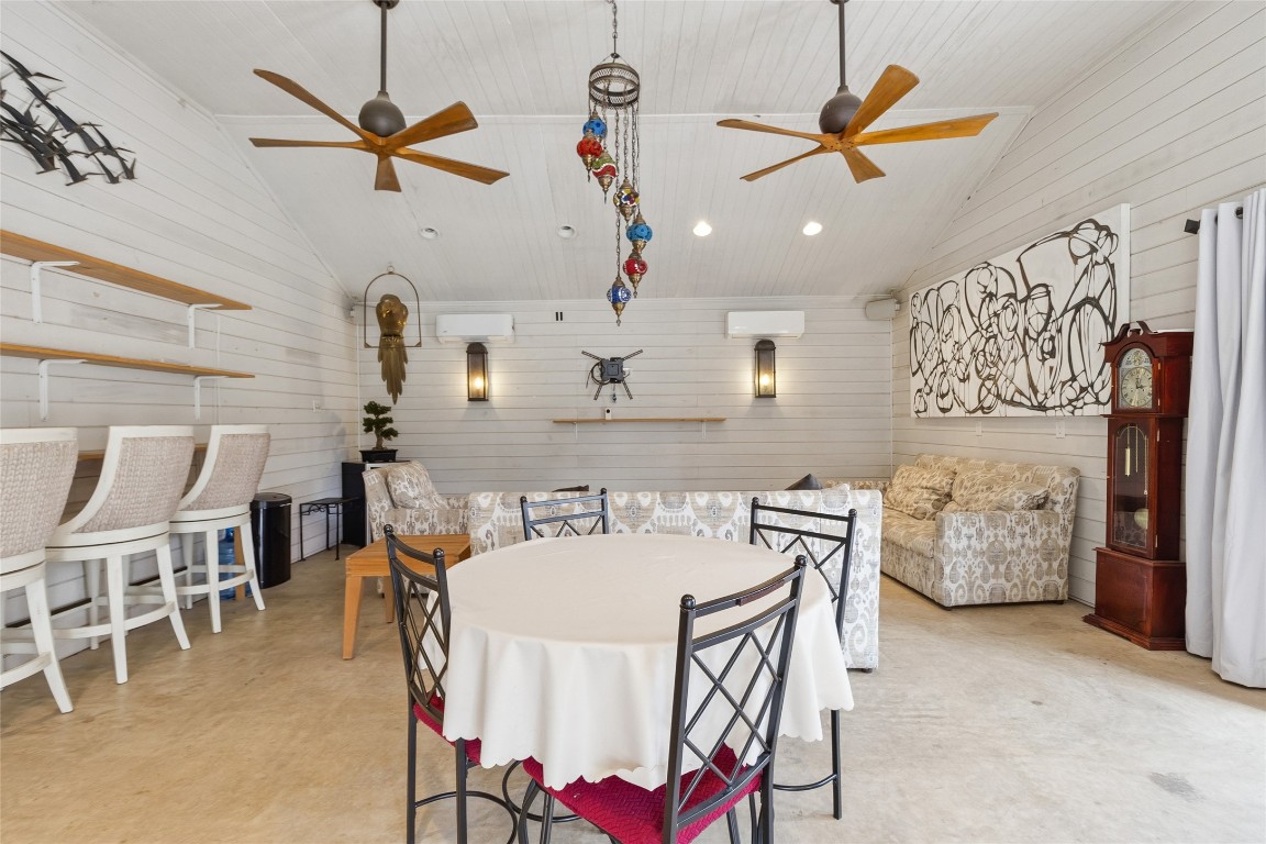 1914 Peppermill Road Houston, TX 77080 - Photo 31 of 43 This space really opens up from this angle—plenty of room to gather, relax, and enjoy a bright, comfortable setting that feels like its own retreat inside your home.