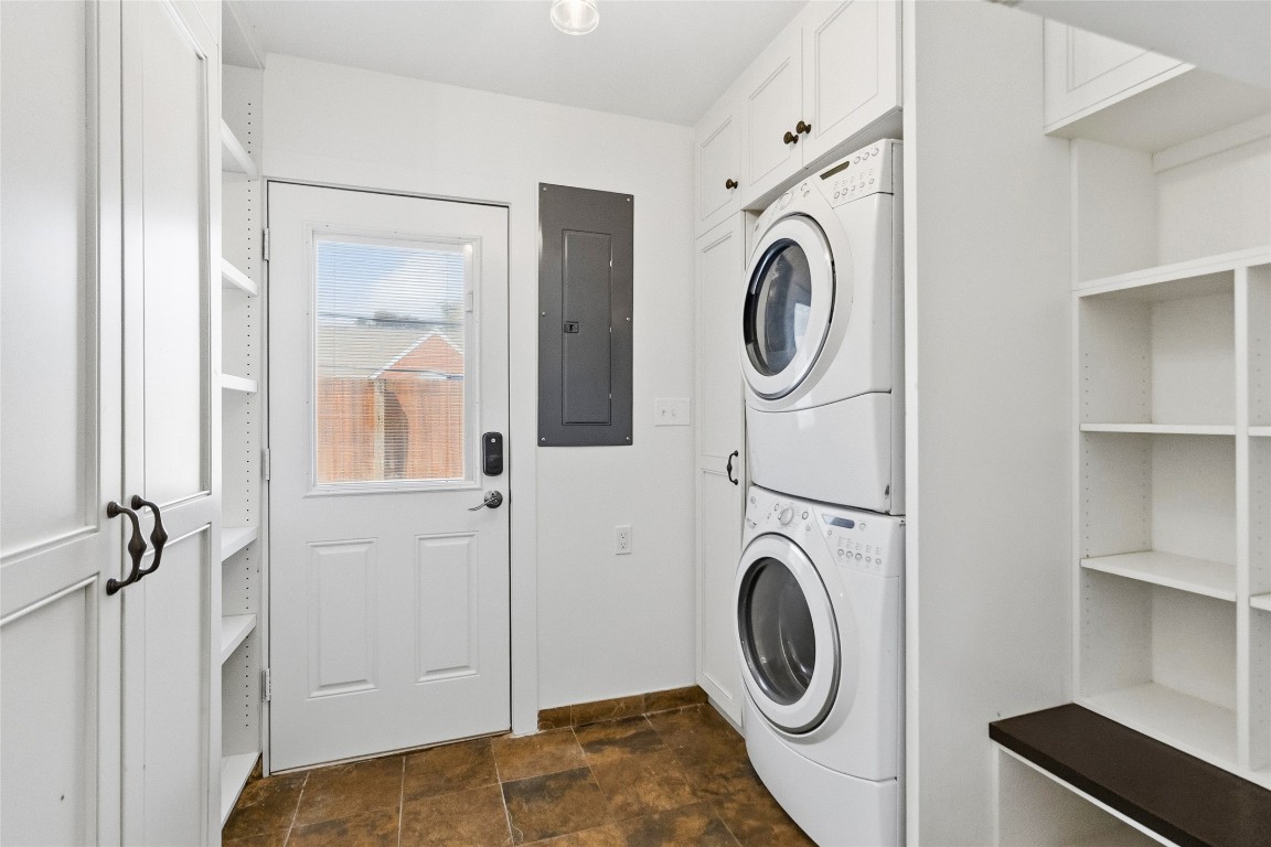1914 Peppermill Road Houston, TX 77080 - Photo 38 of 43 Laundry day feels easier here with built-in storage, counter space, and a functional layout that keeps everything within reach.