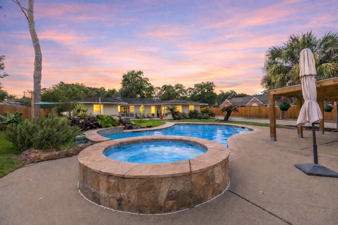 1914 Peppermill Road Houston, TX 77080 - Photo 4 of 43 And here’s the centerpiece—your pool and spa combo, ready for long summer days, evening swims, and making your backyard feel like a private getaway.