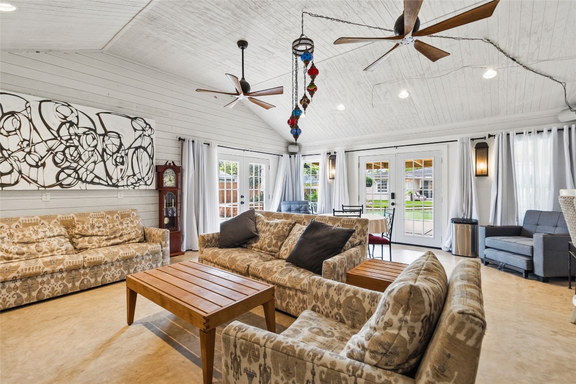 1914 Peppermill Road Houston, TX 77080 - Photo 8 of 43 Step inside this bright, airy pool house where walls of windows and soaring ceilings create the ultimate flex space—whether it’s lounging, hosting, or just enjoying the view of your backyard year-round. Complete with 2 mini splits.