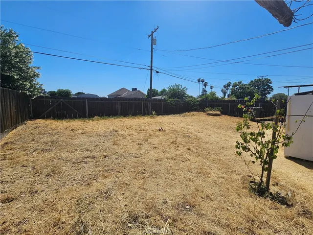 a house view with a backyard space