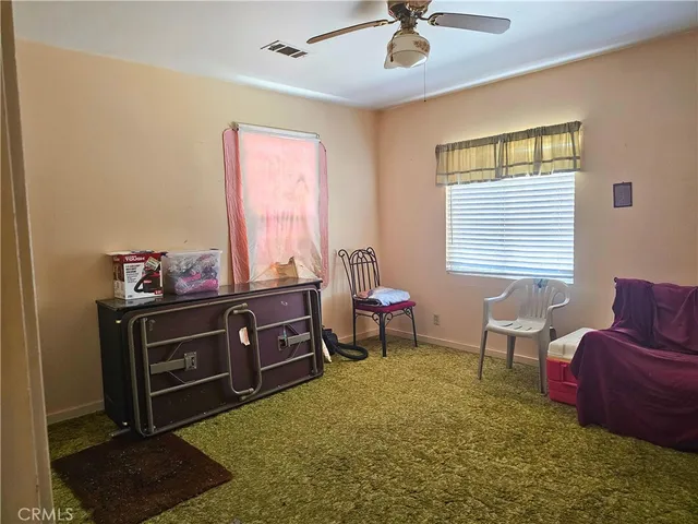 a bathroom with shower and a mirror