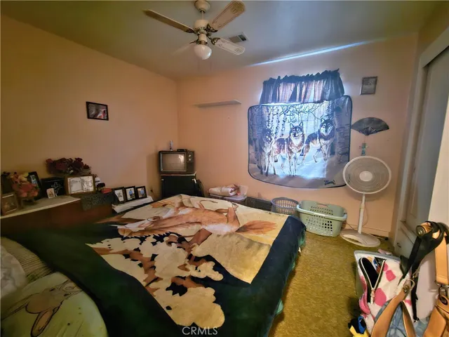 a bathroom with a sink mirror and toilet