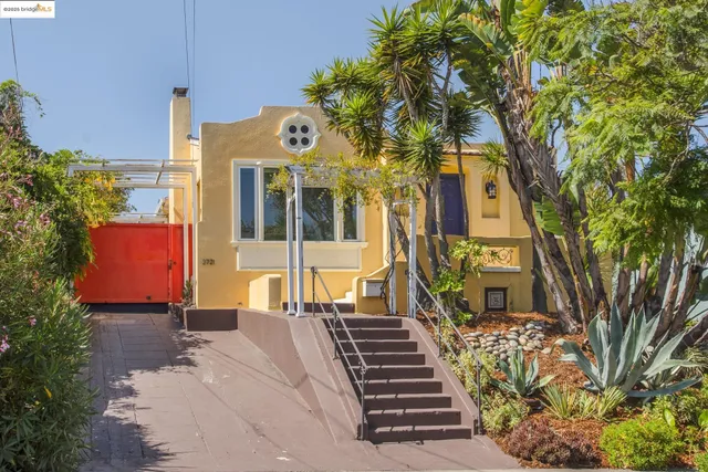 a view of a building with a tree