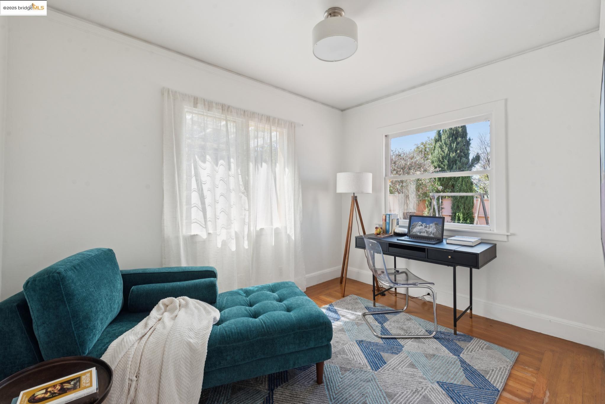 2721 Best Avenue Oakland, CA 94619 - Photo 16 of 28 Sitting room featuring a desk and wood finished floors
