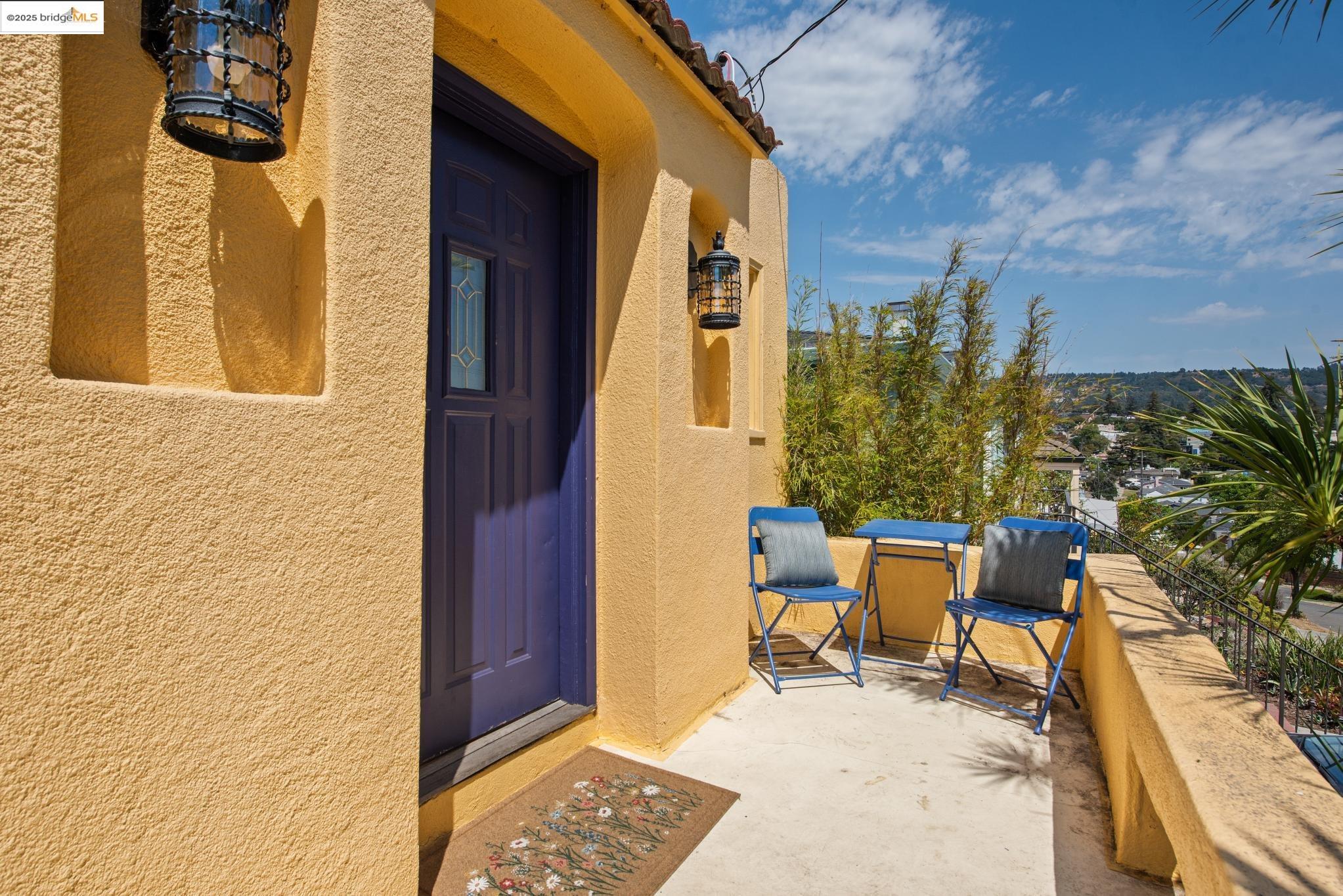 2721 Best Avenue Oakland, CA 94619 - Photo 2 of 28 View of exterior entry with stucco siding and a tile roof