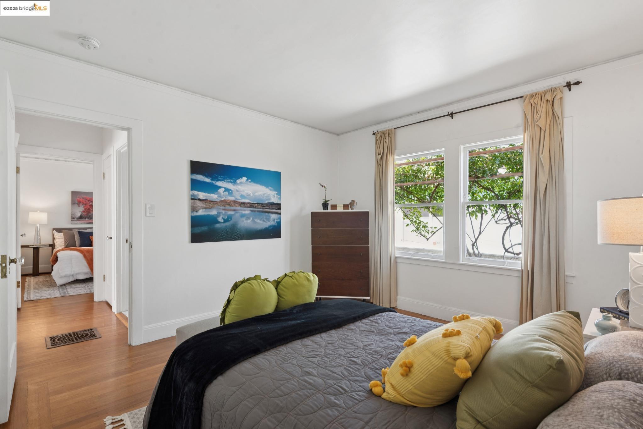 2721 Best Avenue Oakland, CA 94619 - Photo 21 of 28 Bedroom with wood finished floors and baseboards
