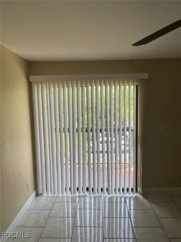 a view of a porch with wooden floor