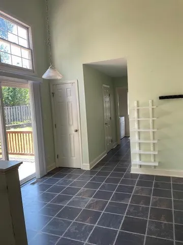 a view of a kitchen with a sink and a microwave