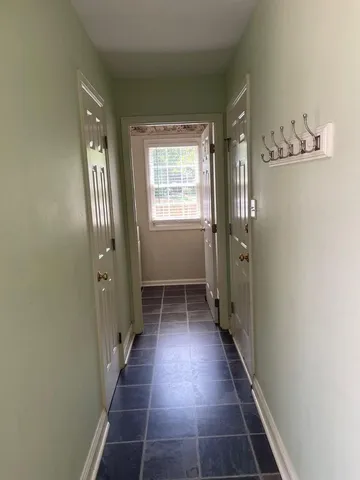 a view of entryway with livingroom