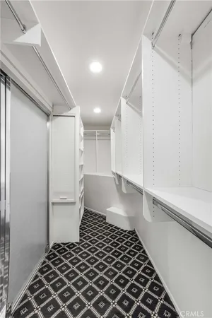 a bathroom with a granite countertop sink mirror and double