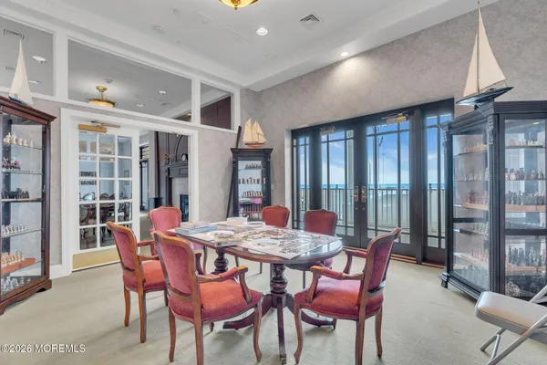 a view of a dining room with furniture window and outside view