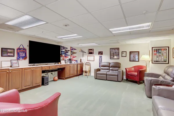 a living room with furniture and a table