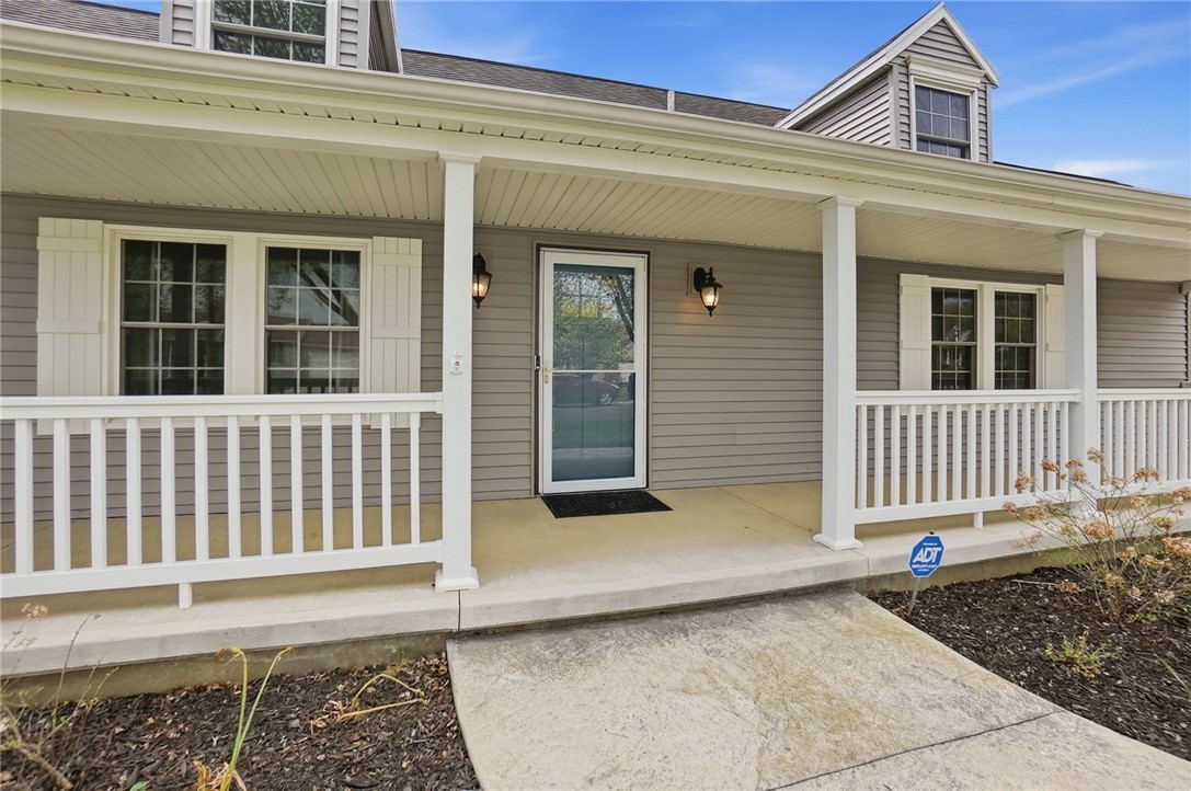 135 Concord Farm Road Englewood, OH 45322 - Photo 5 of 46 This charming residence features a welcoming covered porch, perfect for enjoying peaceful moments outdoors.