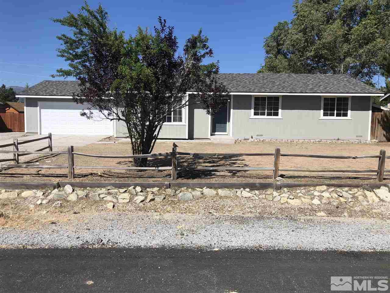 3865 Snipe Drive Reno, NV 89508 - Photo 1 of 19 a view of a house with snow on the road