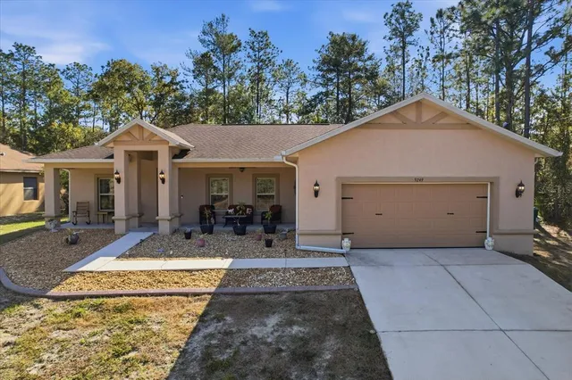 a view of a house with entertaining space