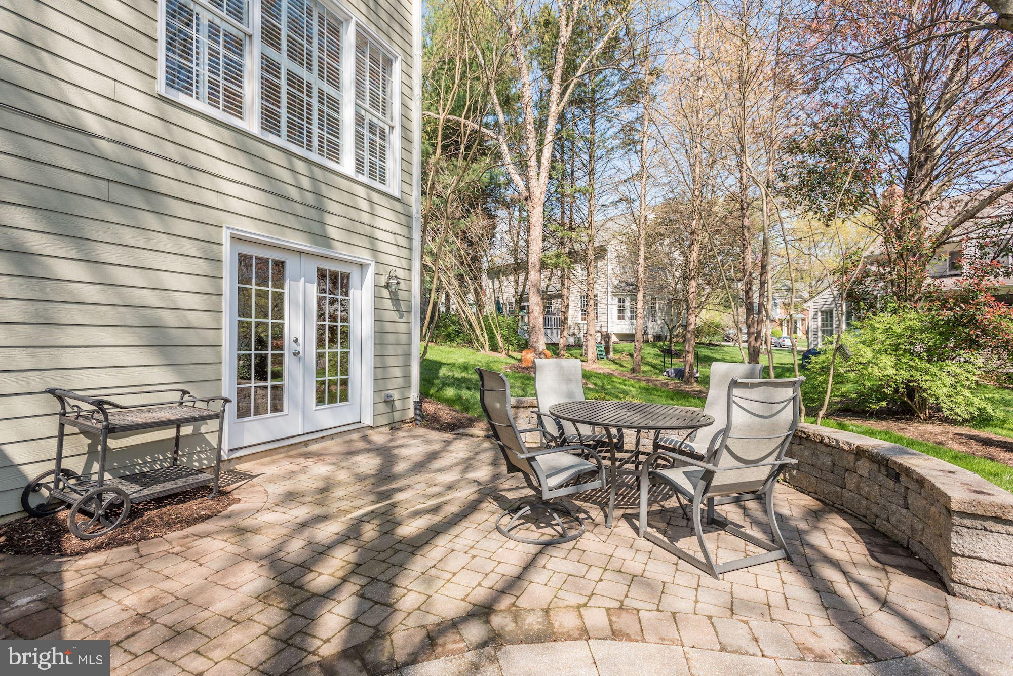 11412 Night Star Way Reston, VA 20194 - Photo 41 of 49 Inviting stone patio off the rec room