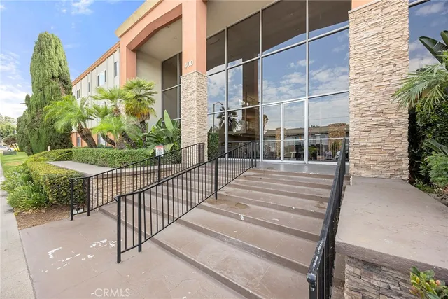 a view of a building with a window and pathway