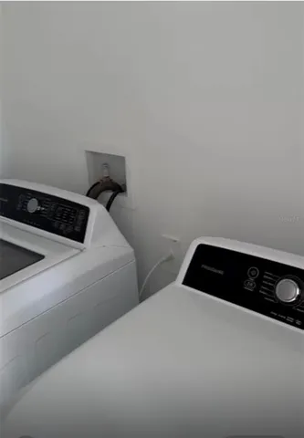 a bedroom with a bed and a cabinets