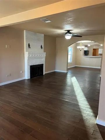 a view of livingroom and hardwood floor