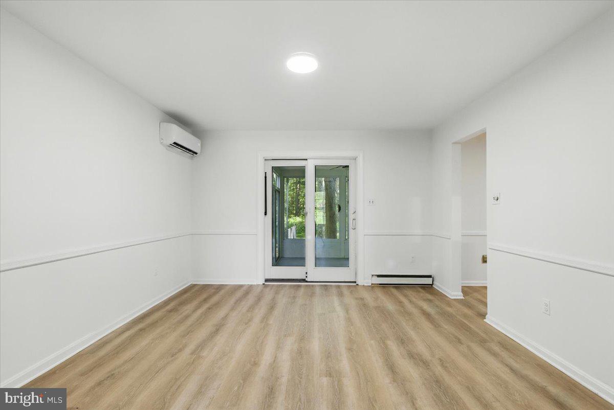 1347 West River Road Shady Side, MD 20764 - Photo 8 of 42 Large dining room w/sliders to sunroom