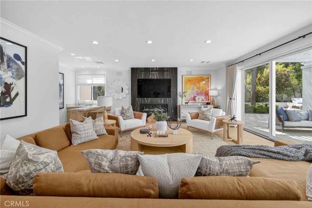 25714 Simpson Place Calabasas, CA 91302 - Photo 14 of 44 a living room with furniture and a flat screen tv