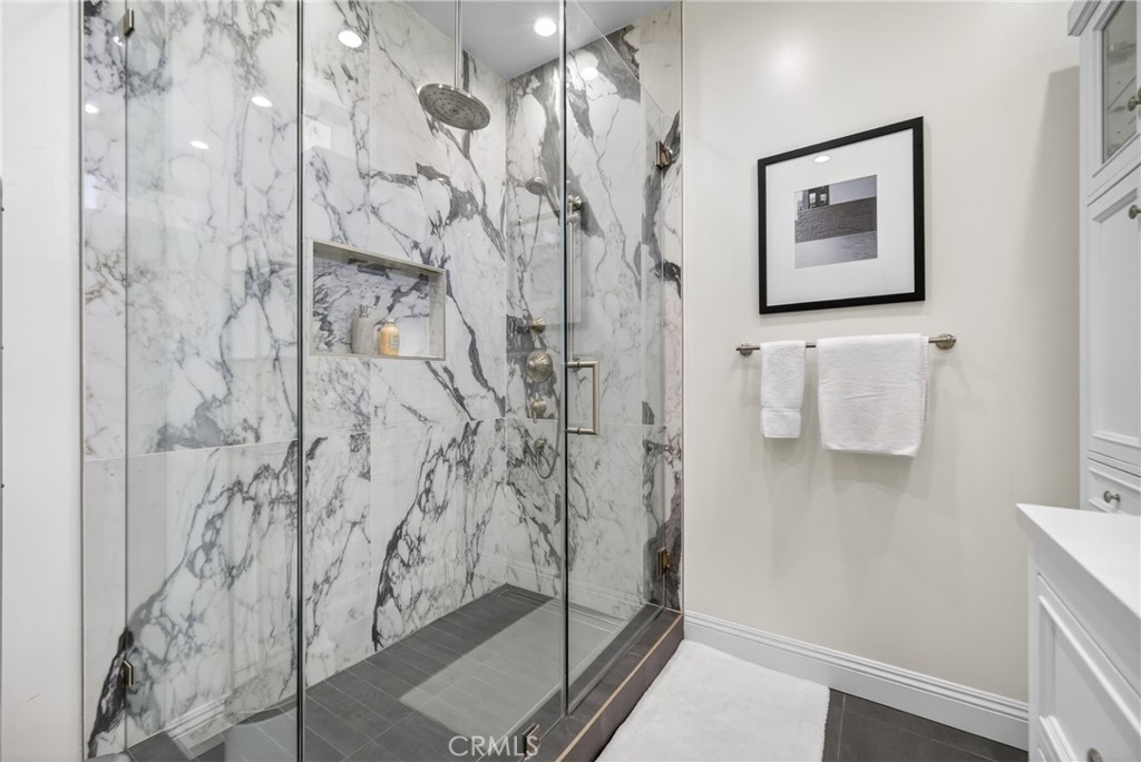 25714 Simpson Place Calabasas, CA 91302 - Photo 30 of 44 a bathroom with a shower