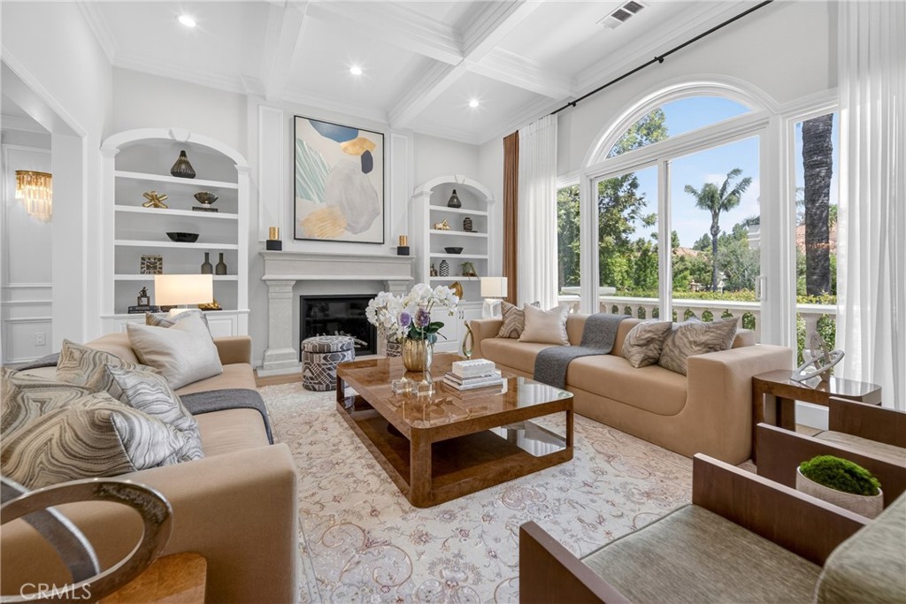 25714 Simpson Place Calabasas, CA 91302 - Photo 3 of 44 a living room with furniture fireplace and a large window