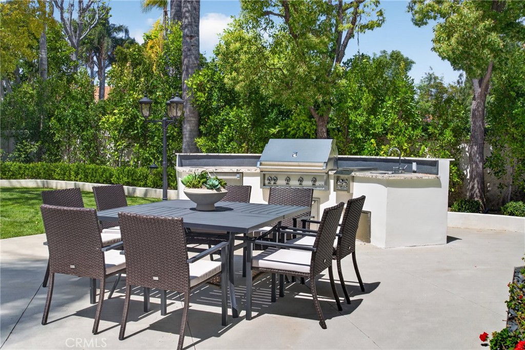 25714 Simpson Place Calabasas, CA 91302 - Photo 38 of 44 a view of a dinning table and chairs on the roof deck