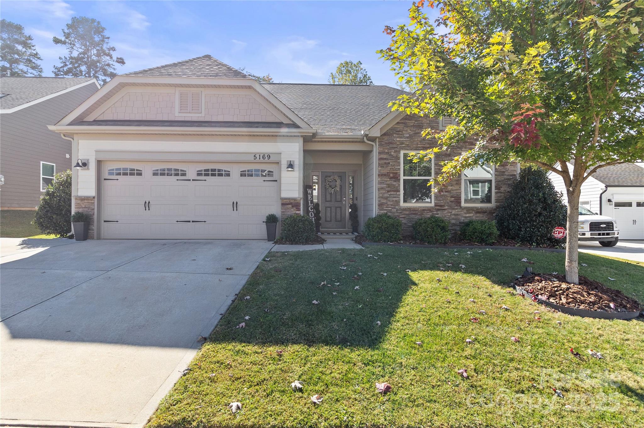 5169 Devonshire Road Denver, NC 28037 - Photo 2 of 46 a front view of a house with garden