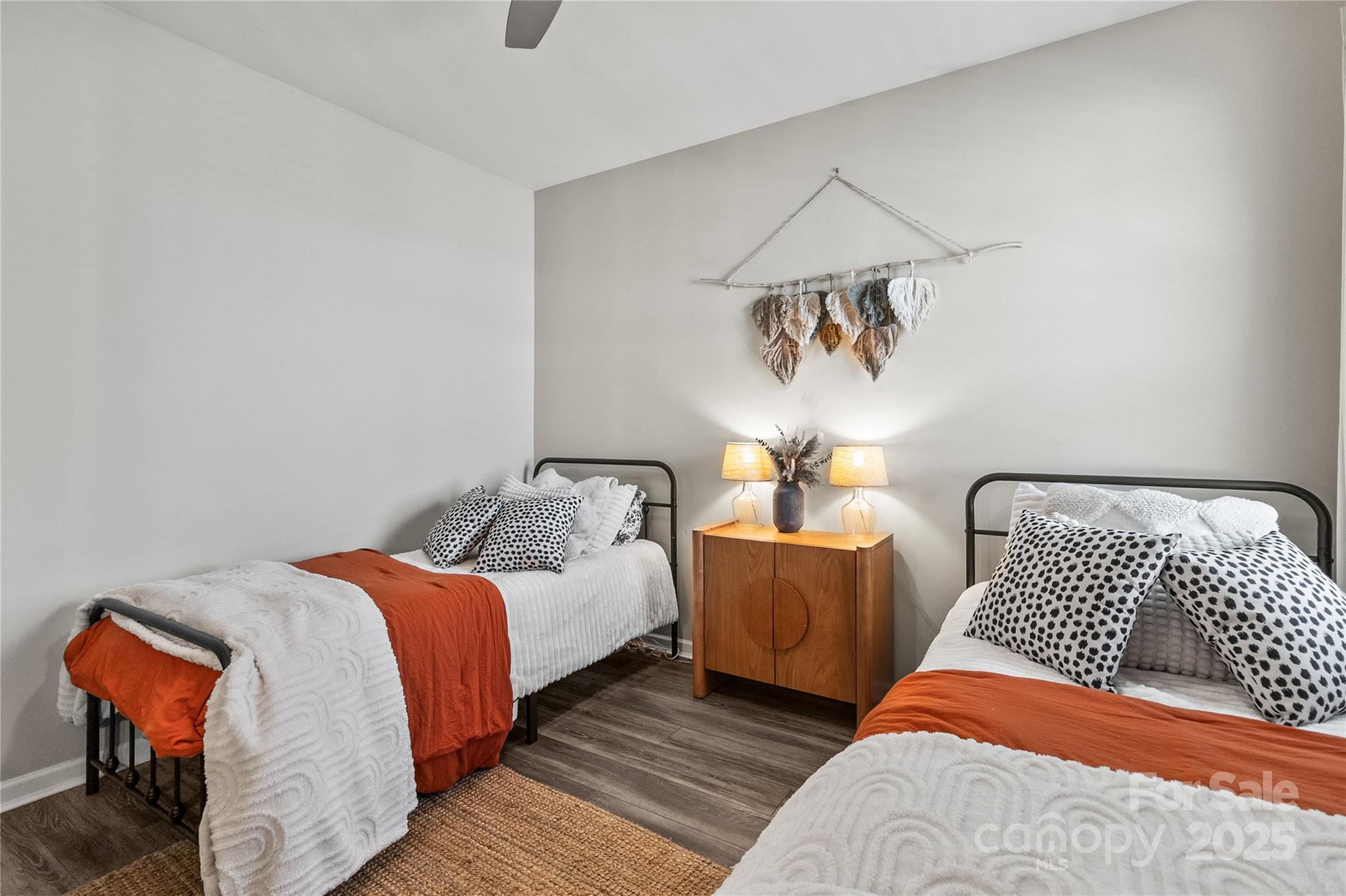 5169 Devonshire Road Denver, NC 28037 - Photo 26 of 46 a bedroom with two beds and painted walls