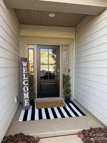 a view of a balcony with furniture