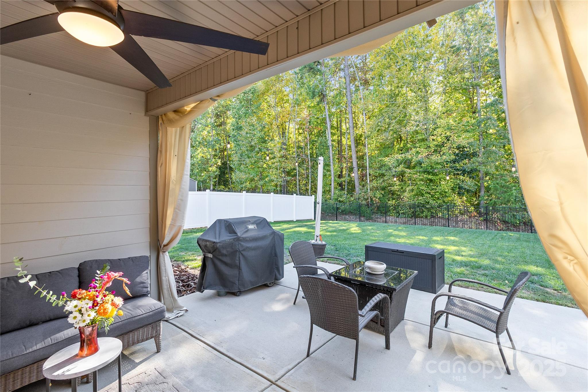5169 Devonshire Road Denver, NC 28037 - Photo 33 of 46 a backyard of a house with outdoor seating