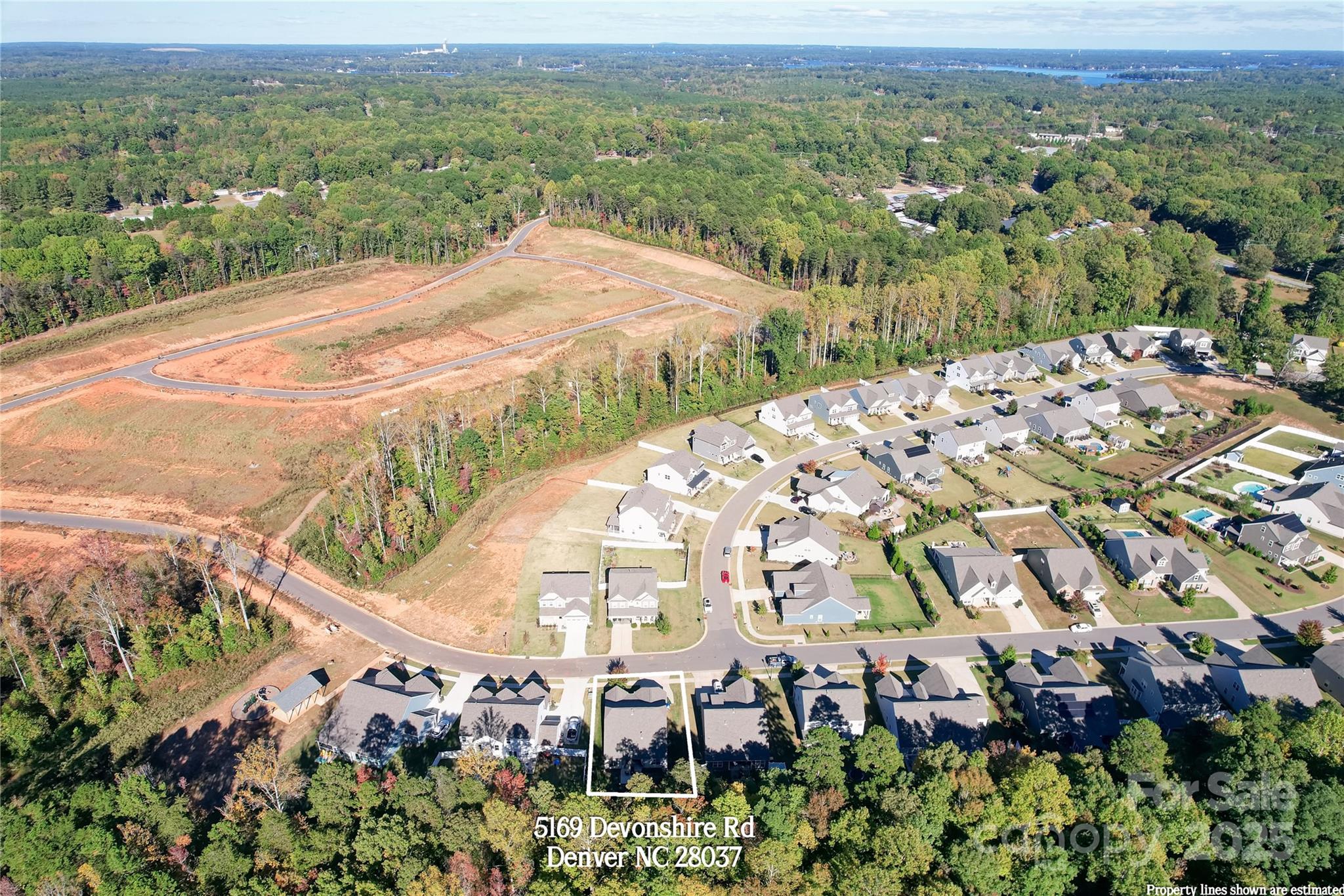 5169 Devonshire Road Denver, NC 28037 - Photo 43 of 46 an aerial view of a house with a mountain