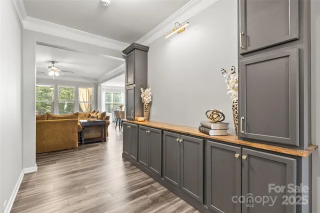 a view of a kitchen with furniture and a window