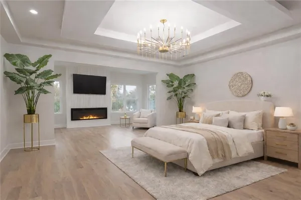 a bedroom with a bed and a fireplace