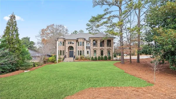 front view of a house with a yard