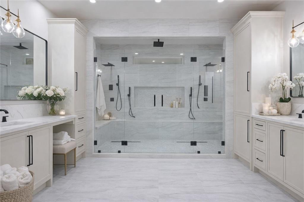 1694 Harts Mill Road Northeast Brookhaven, GA 30319 - Photo 22 of 44 a spacious bathroom with a double vanity sink mirror and bathtub