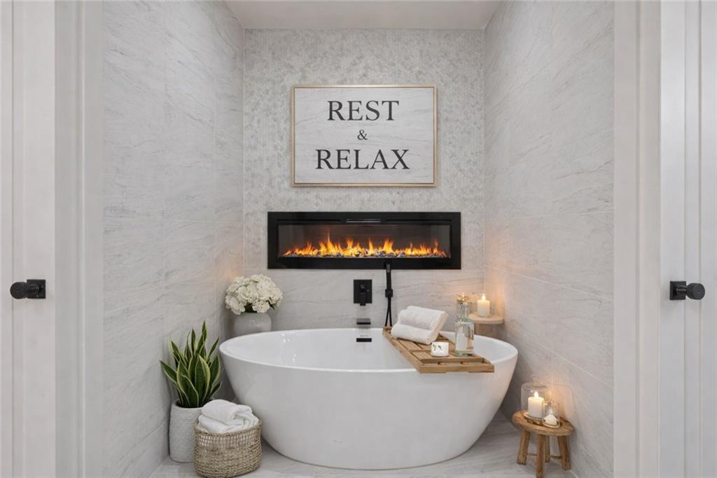 1694 Harts Mill Road Northeast Brookhaven, GA 30319 - Photo 23 of 44 a bathroom with a sink and a mirror